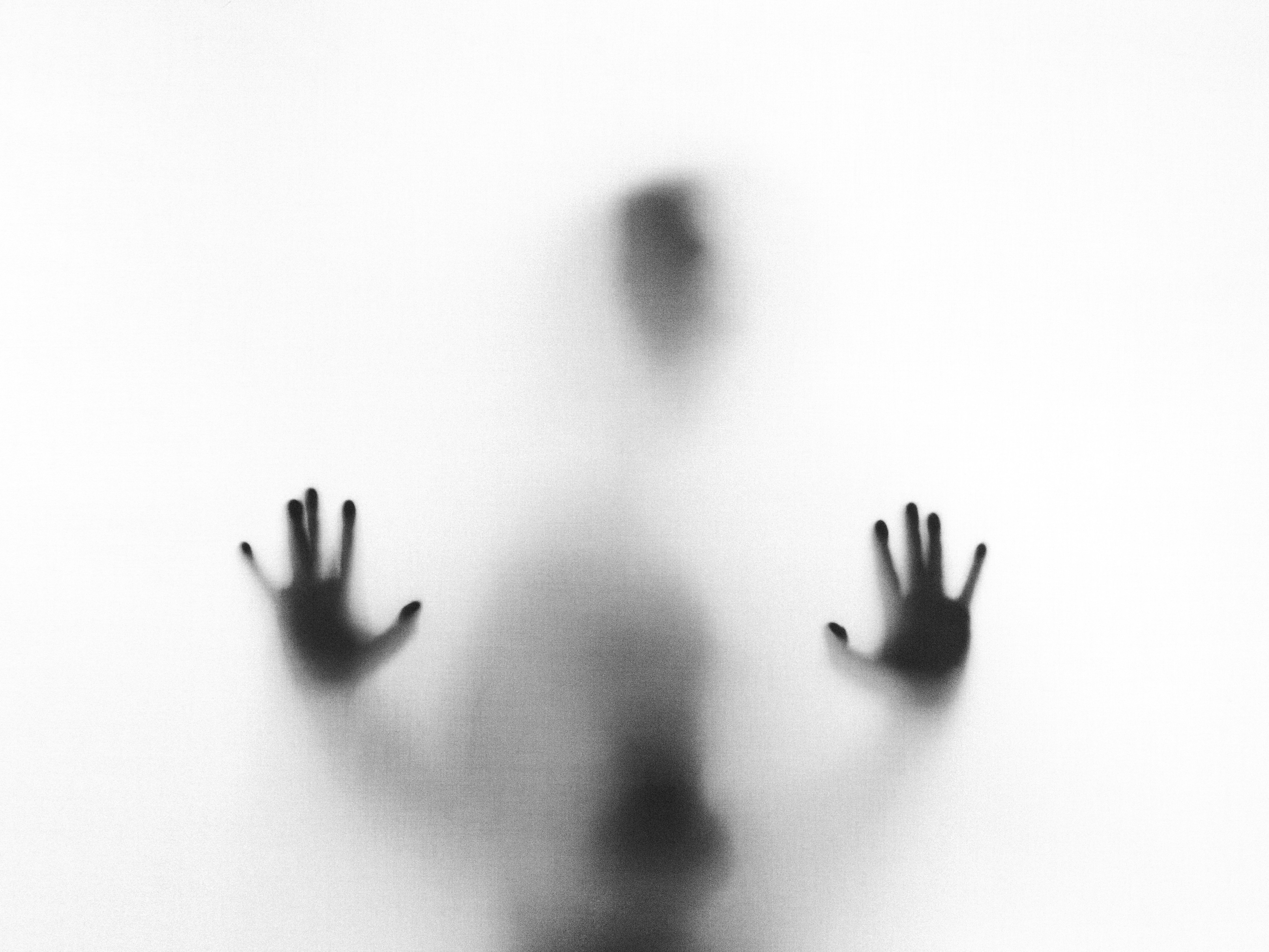 Shadow behind the glass